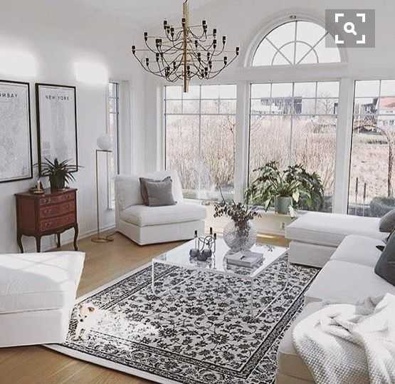 Белые ковры (53 фото): пушистые и мягкие овальные модели с длинным ворсом в интерьере гостиной