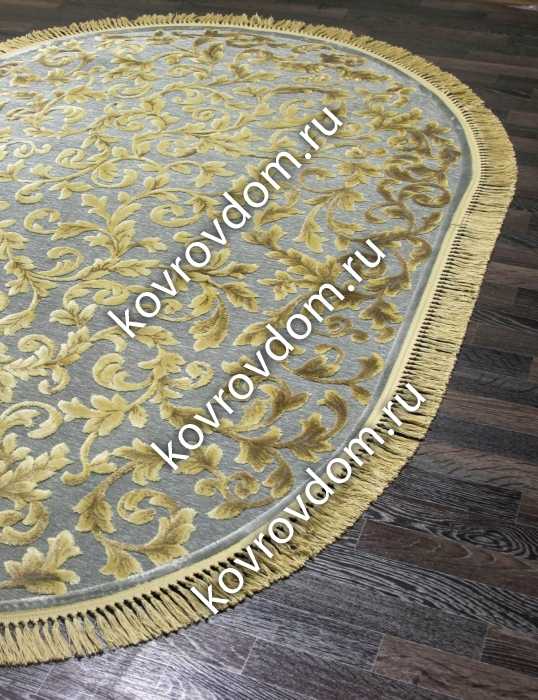 Плитка-панно на пол (29 фото): напольные керамические покрытия в виде ковра, бежевые модели с золотом в интерьере