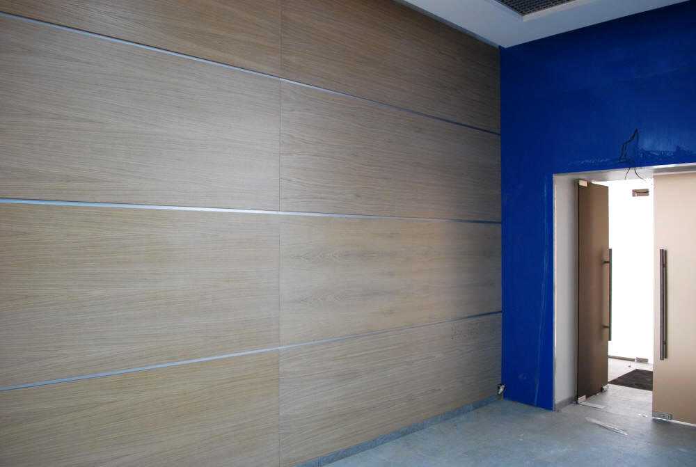Стеновые панели в интерьере офиса: дизайнерские решения с вариативным применением эффектного настенного декора